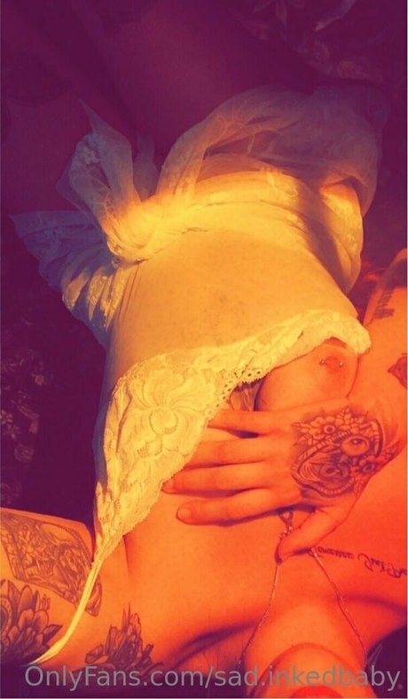 sad inkedbaby onlyfans model images