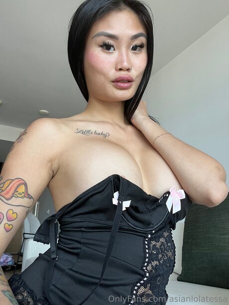 Asianlolatessa pornstar erotic photo