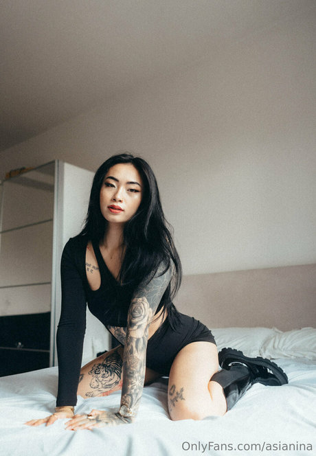 asianina nude actress photos