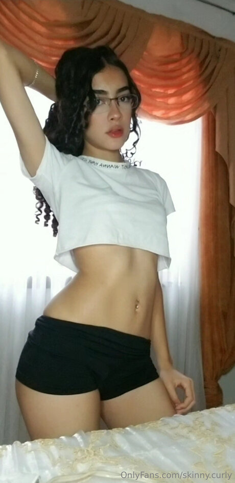 Skinny Curly pornstar nude image