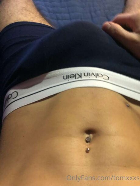 Tomxxxs pretty pornstar image